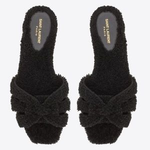 Saint Laurent Tribute genuine shearling flat sandals.